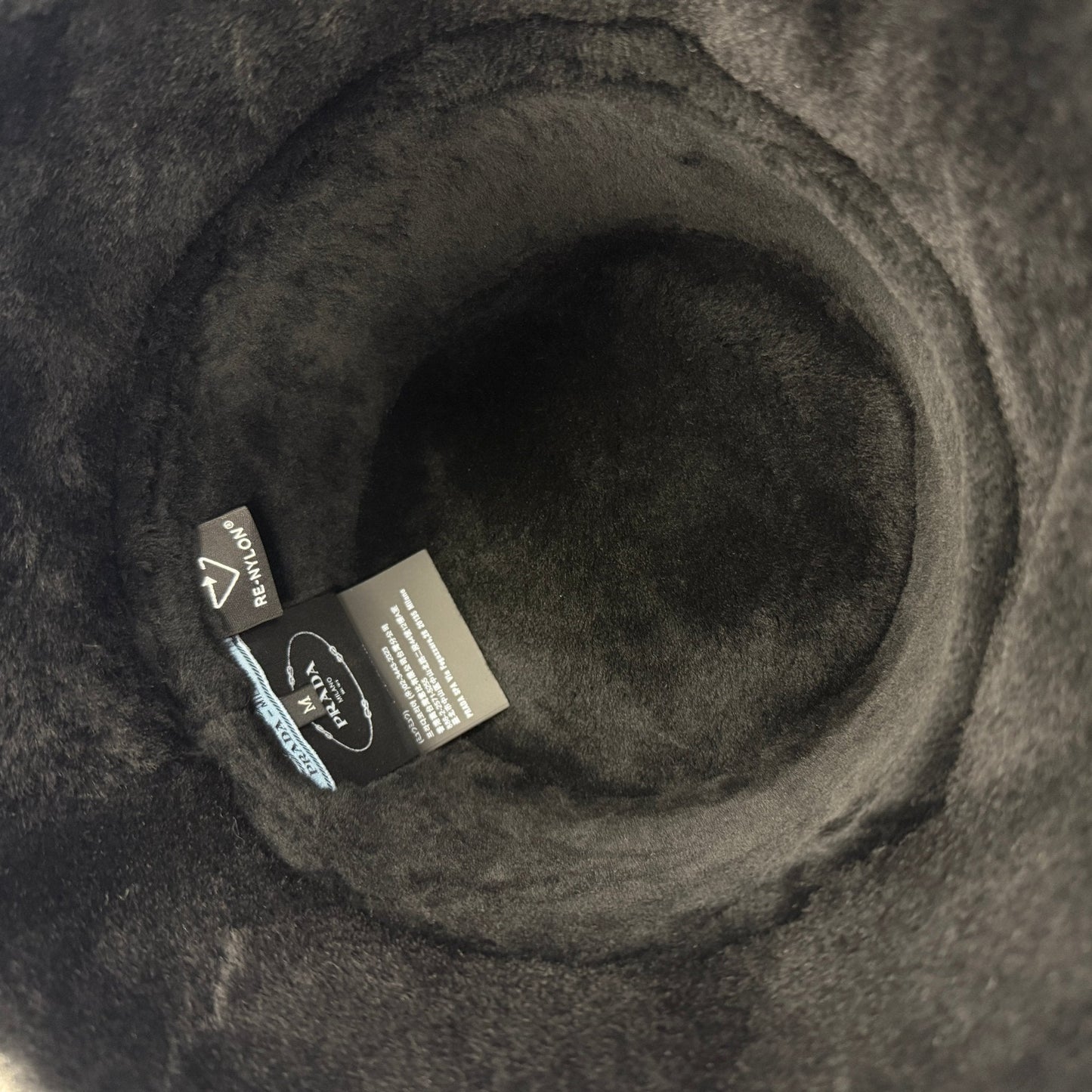 Re-Nylon and Shearling Bucket Hat in Nero
