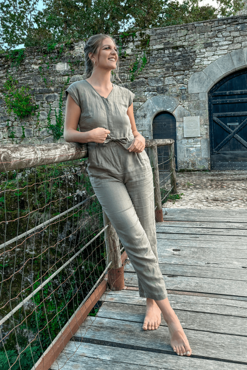 Olive Green Jumpsuit with V-Neck, Micro Sleeves, and Tapered Legs by DC-Reistor