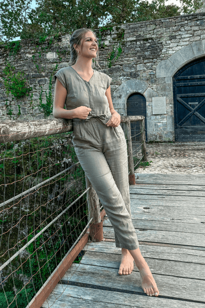 Olive Green Jumpsuit with V-Neck, Micro Sleeves, and Tapered Legs by DC-Reistor